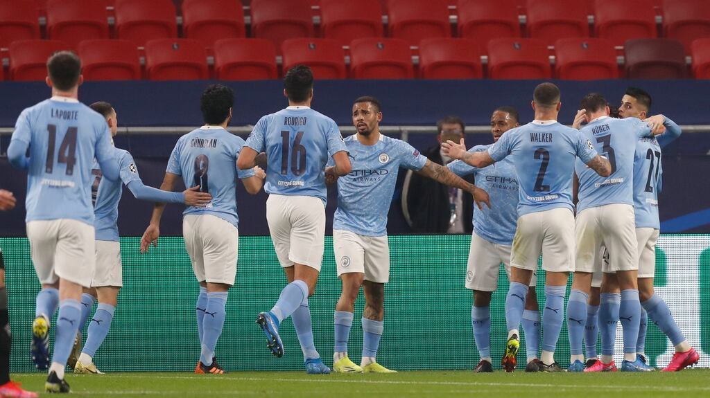 Manchester City players celebrate after Bernardo Silva scored his side’s opening goal during the Champions League round of 16 first leg match against Borussia Monchengladbach at the Puskas Arena stadium in Budapest. Photo: Laszlo Balogh/AP Photo