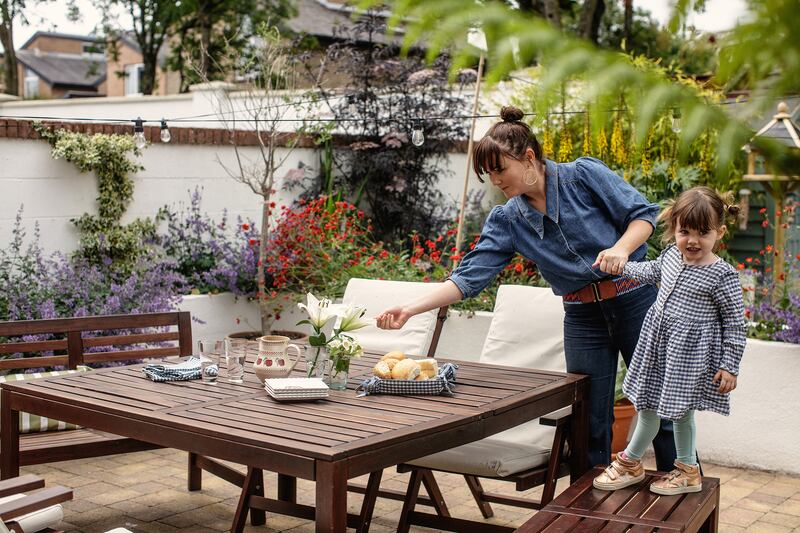 Kelly, with and daughter Síofra, tends to design touches outdoors