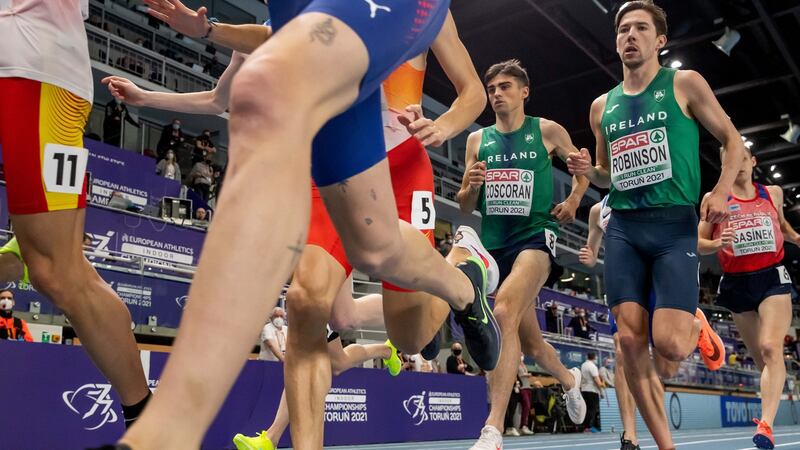 Ireland’s Andrew Coscoran and Paul Robinson during the 2021 European Athletics Indoor Championships men’s 1500m final. Photograph: Inpho