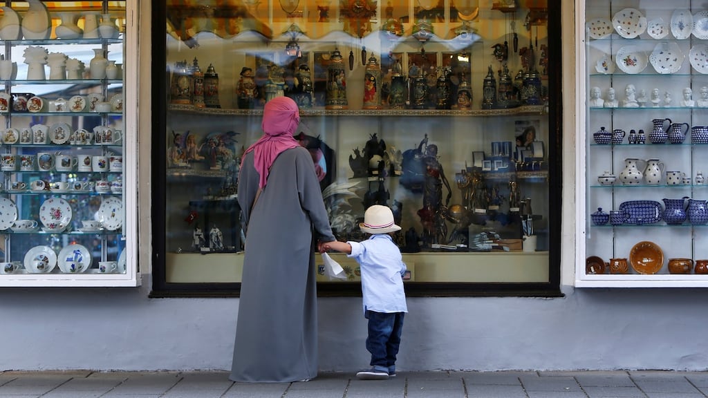 A woman wears a burka in Garmisch-Partenkirchen, Germany. Chancellor Angela Merkel said, in an interview to appear on Friday, that the burka was a “political and legal consideration” and that her interior minister had her “full support” in the search for a solution. Photograph: Michaela Rehle/Reuters