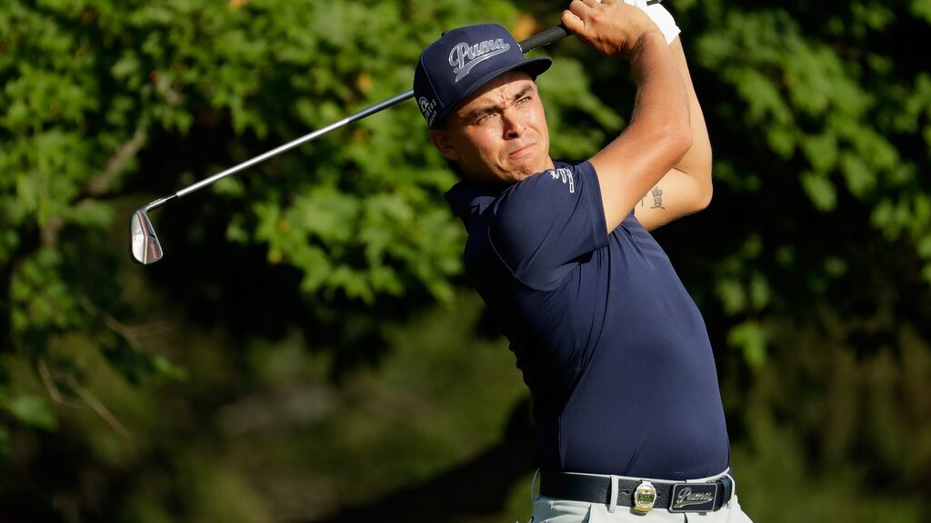 Rickie Fowler of the United States plays his shot from the 12th tee during the first round of the 2016 PGA Championship at Baltusrol Golf Club in Springfield, New Jersey. Photo: Andy Lyons/Getty Images