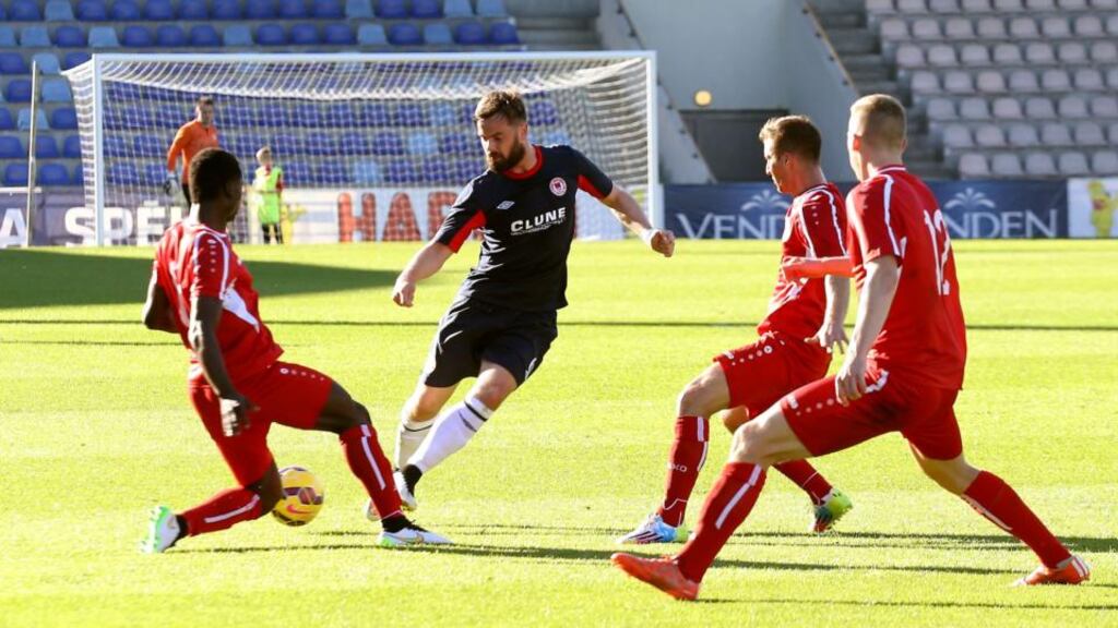 St Patrick’s Athletic midfielder Greg Bolger finds his path block by a trio of Skonto Riga players during the Europa League first qualifying round first leg at Skonto Stadions. Photograph: Evija Trifanova/Inpho