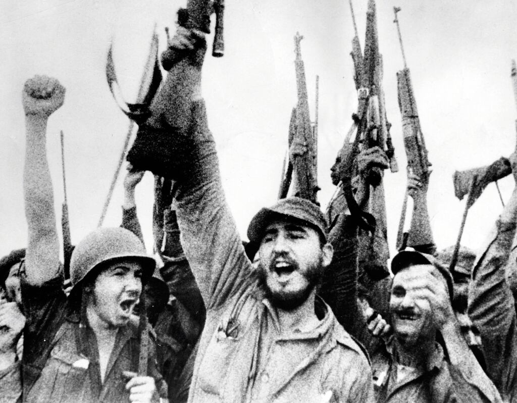 Fidel Castro with guerilla fighters in the Sierra Maestra, circa 1958. Photograph: Photo12/Universal Images Group via Getty