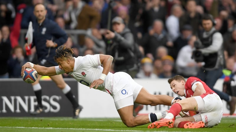 Anthony Watson reaches to score England’s first try against Wales. Photograph: Mike Hewitt/Getty Images)