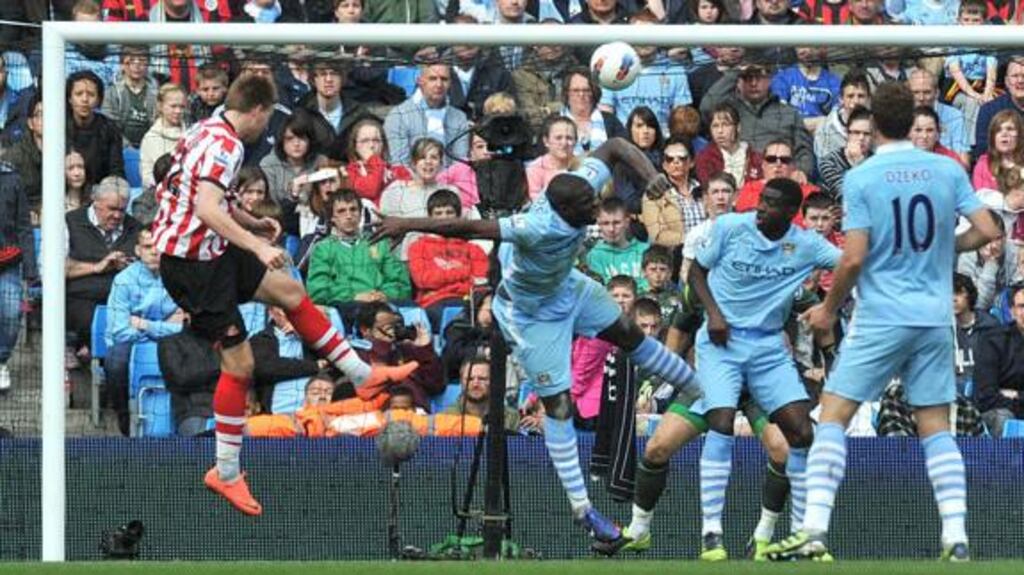 Sunderland's Nicklas Bendtner scores his sides second goal against Manchester City at the Etihad Stadium. - Photograph: Martin Rickett/PA Wire