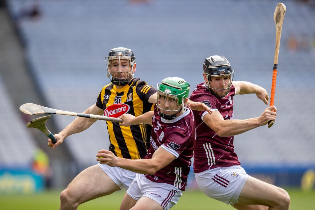 Kilkenny's Conor Fogarty battles with Galway’s Joseph Cooney and Jack Grealish. Photograph: Morgan Treacy/Inpho