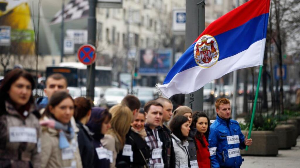 People block a street during an anti-European Union protest in Belgrade on Monday. Photograph: Marko Djurica/Reuters