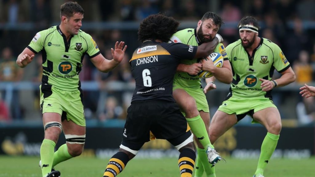Northampton Saints Alex Corbisiero is tackled by Wasps Ashley Johnson. The former will be out of action until the near year. Photograph: David Davies/PA Wire.