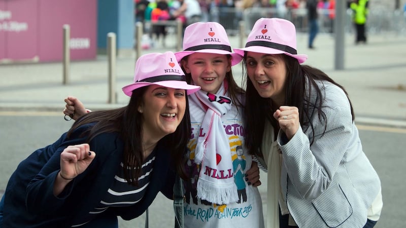 One Direction fans Nicole Cullen (centre) with her aunt Catriona Neville (left) and mother Bridget Cullen, all from Wexford, ahead of the boyband’s show at 3Arena in Dublin, October 16th, 2015. Photograph: Gareth Chaney Collins