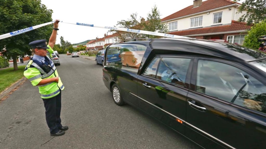 The woman’s body is removed from the scene in the Deepdales estate, Bray, Co Wicklow. Photograph: Colin Keegan/Collins