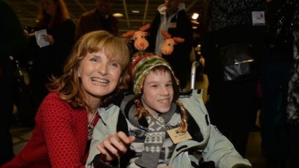 Adi Roche greets a teenager from the Chernobyl region of Belarus who visited Ireland through her Chernobyl Children International charity. Photograph: Alan Betson