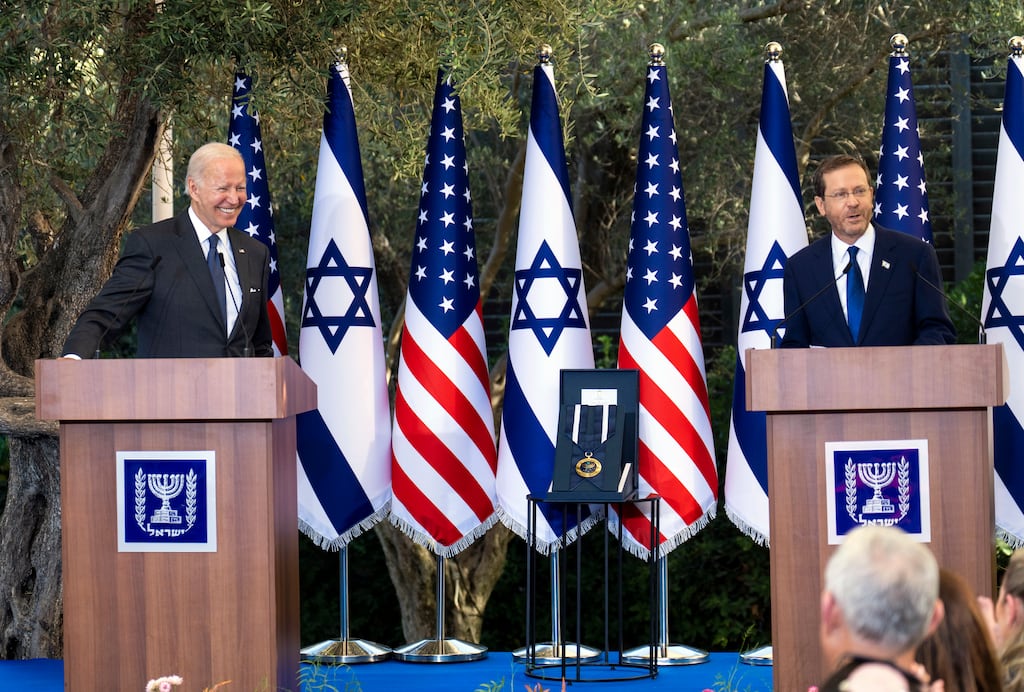 US president Joe Biden smiles as he is presented with Israel’s Presidential Medal of Honor by president Isaac Herzog in Jerusalem. Photograph: Doug Mills/The New York Times