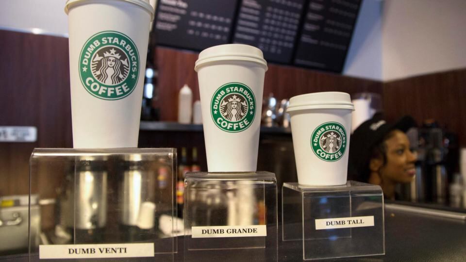 Cups stand on display cases at “Dumb Starbucks”, a parody store of the Starbucks Coffee chain, in Los Angeles. Photo: Reuters