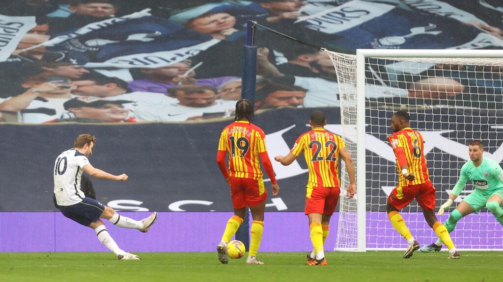 Harry Kane scores Tottenham’s first goal against West Bromwich Albion. Photograph: Getty Images