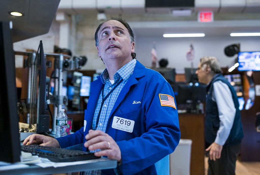 Traders work on the floor of the New York Stock Exchange as US equities rebounded Tuesday after last week’s rout erased nearly $2 trillion from the S&P 500. Photograph: EPA