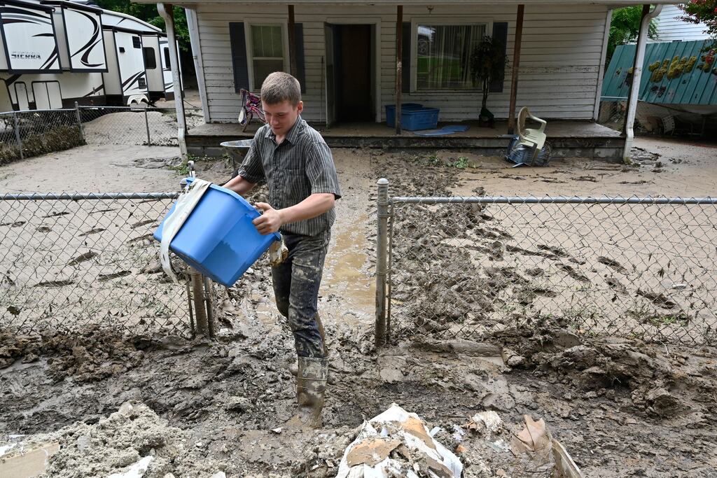 A torrential storm in Kentucky dumped 10in of rain in a matter of hours. Photograph: Timothy D Easley/AP