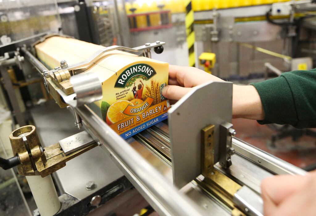 Brand labels for bottles of Robinsons orange fruit and barley squash drink, produced by Britvic.