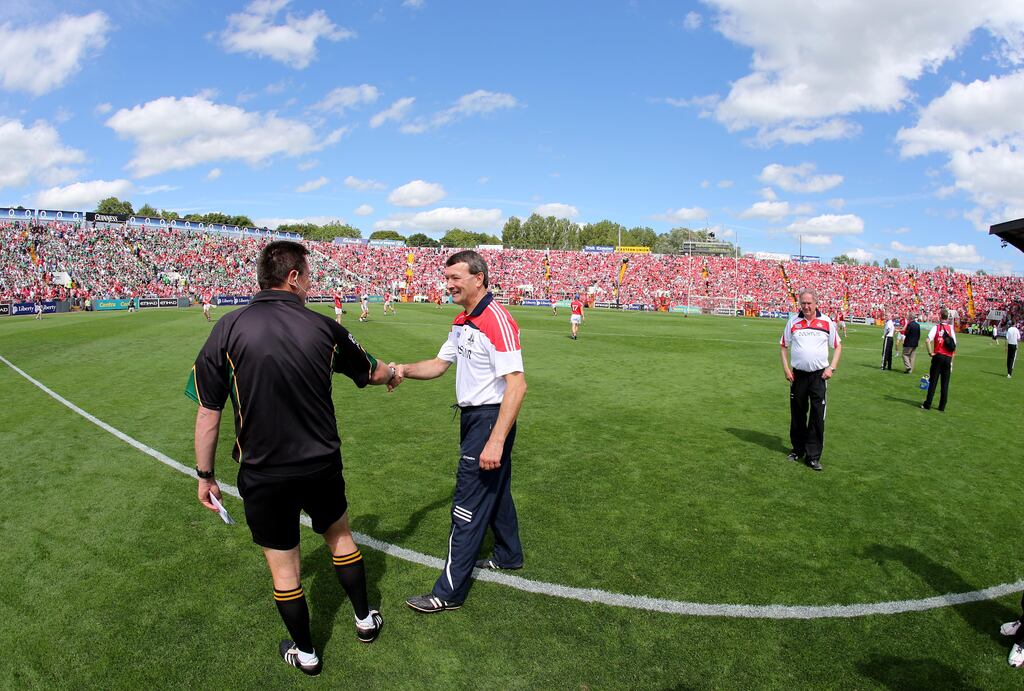 Cork manager Jimmy Barry-Murphy with referee Brian Gavin ahead of the 2014 Munster hurling final against Limerick at Páirc Uí Chaoimh. Photograph: Inpho