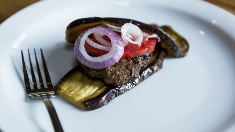 Lamb burger wrapped in aubergine. Photograph: Emma Jervis