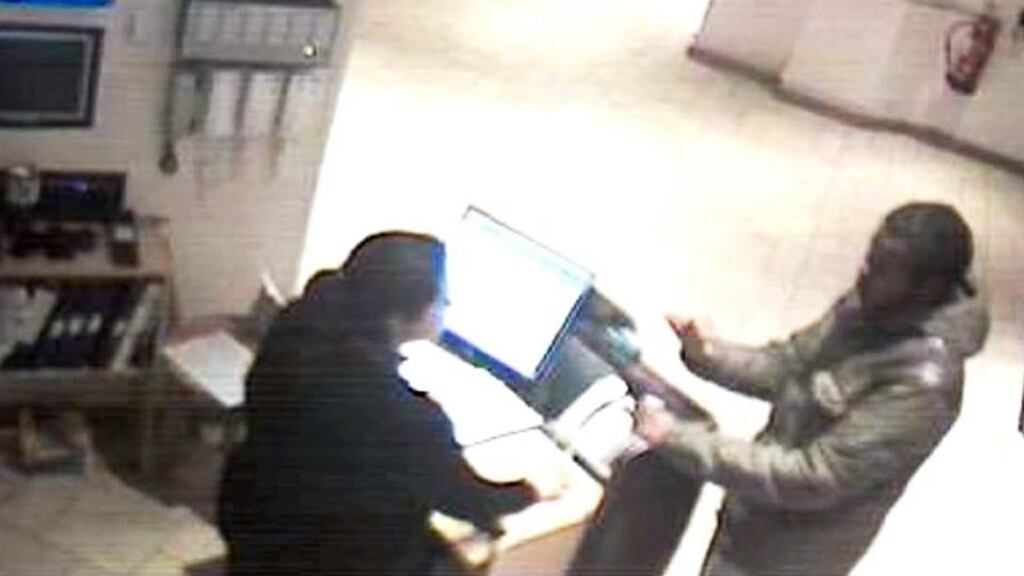 An undated handout CCTV image issued by Avon and Somerset Police of Jusef Abdirizak booking a room in a Premier Inn in Bristol. He was one of 14 convicted of running a sex ring in Bristol .