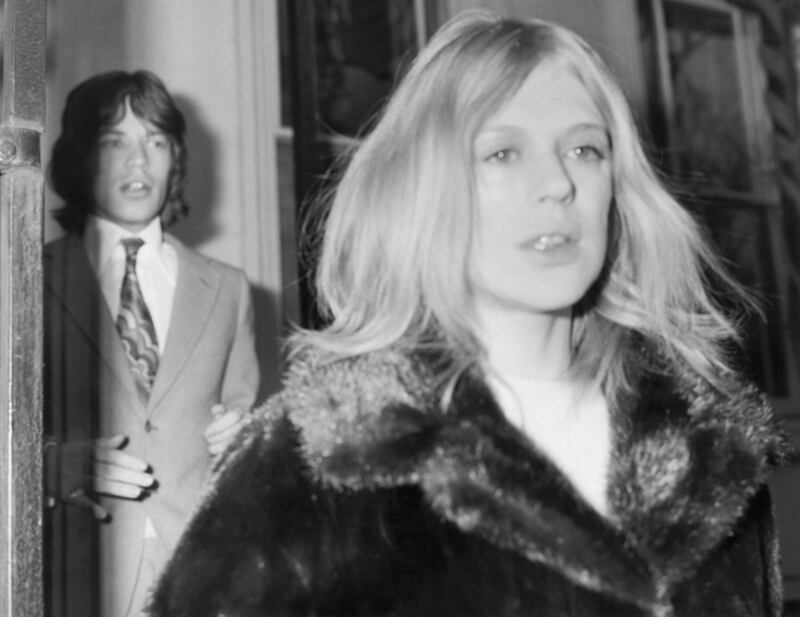Marianne Faithfull with her then boyfriend Mick Jagger of the Rolling Stones on their way to Marlborough Street magistrate’s court, London in December 1969 for their second court appearance after their arrest on a charge of cannabis possession the previous May. Photograph: Central Press/Hulton Archive/Getty Images