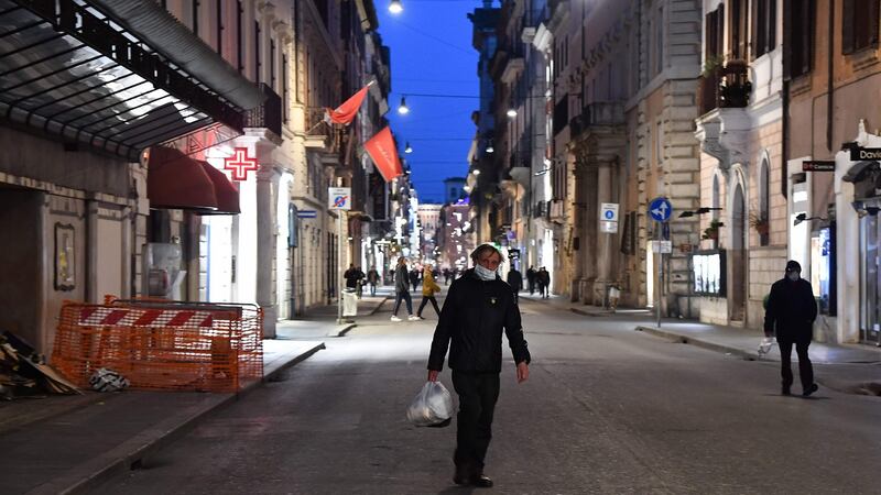 Deserted Via del Corso in Rome: Austria banned entry to people from Italy on Tuesday, introducing checks on its border. Photograph: Tiziana Fabi/AFP