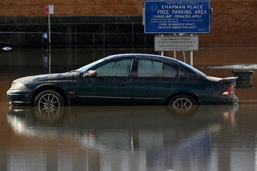 Australia floods: Death toll rises to four, tens of thousands stranded