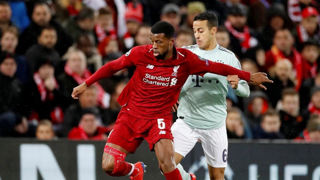 Liverpool’s Georginio Wijnaldum under pressure from Bayern Munich’s Thiago during the goalless draw at Anfield on Tuesday night. Photograph: Carl Recine/Reuters