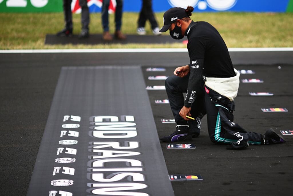 Under the new rules, acts such as taking the knee would no longer be allowed in F1 without express permission. Photograph: Peter Fox/Getty Images