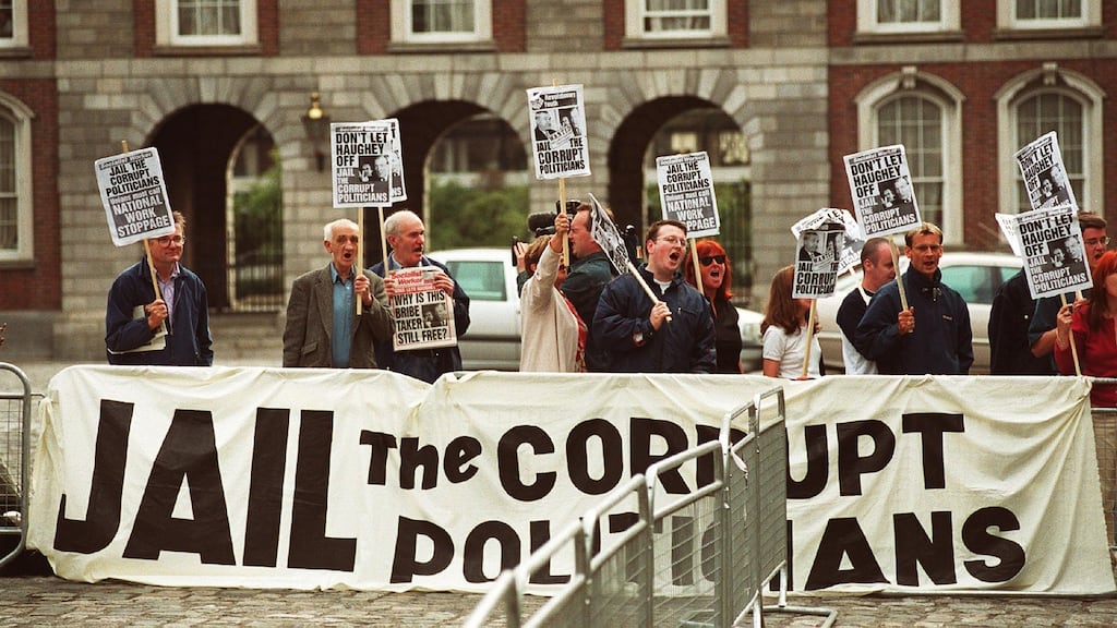 Protesters in Dublin Castle as Charles Haughey arrives at the Moriarty tribunal in 2000. Photograph: Frank Miller