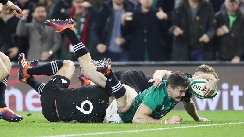 Jacob Stockdale scores Ireland’s try against the All Blacks. Photograph: Niall Carson/PA