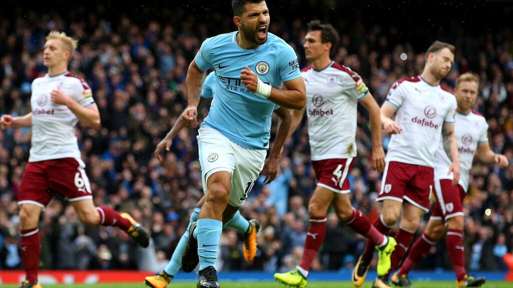 Manchester City striker Sergio Agüero celebrates after scoring from the penalty spot during the Premier League match against Burnley at Etihad Stadium. Photograph: Alex Livesey/Getty Images