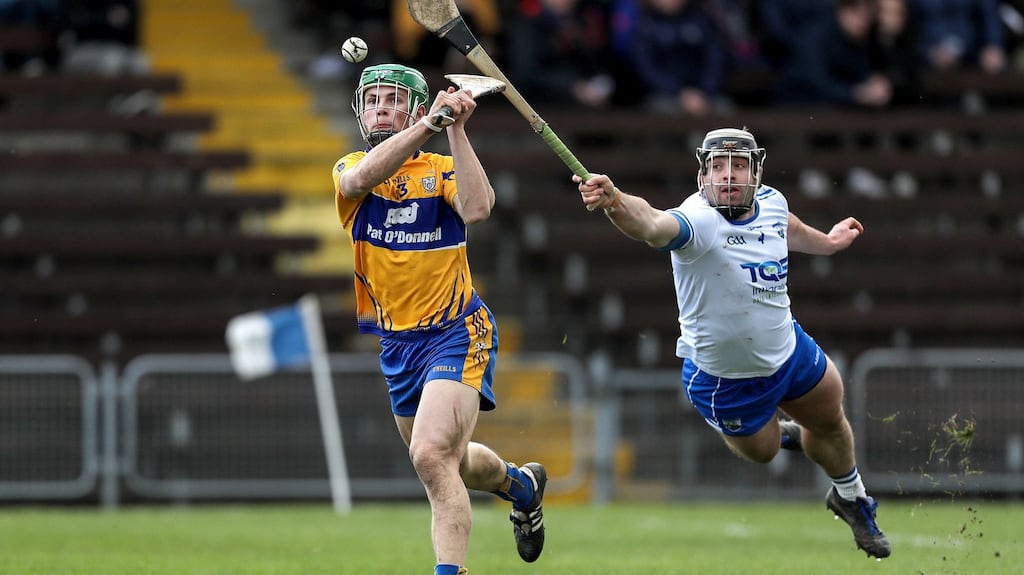 Clare’s David Conroy and Noel Connors of Waterford battle for the ball during their Allianz Hurling League encounter. Photo: Laszlo Geczo/Inpho