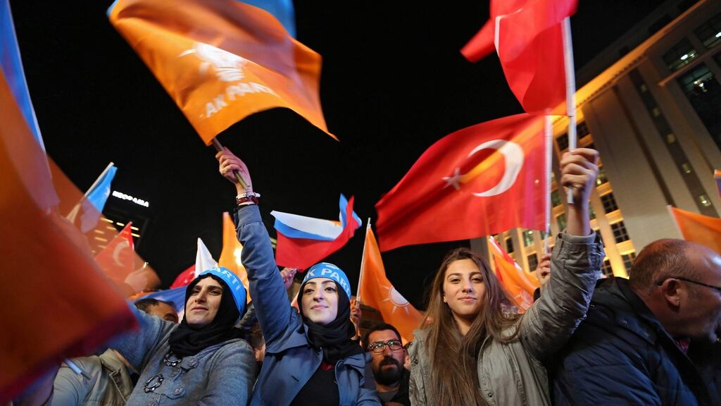 AKP supporters celebrate after hearing the early results of Turkey’s general election in Ankara, Turkey. Photograph: EPA/STR