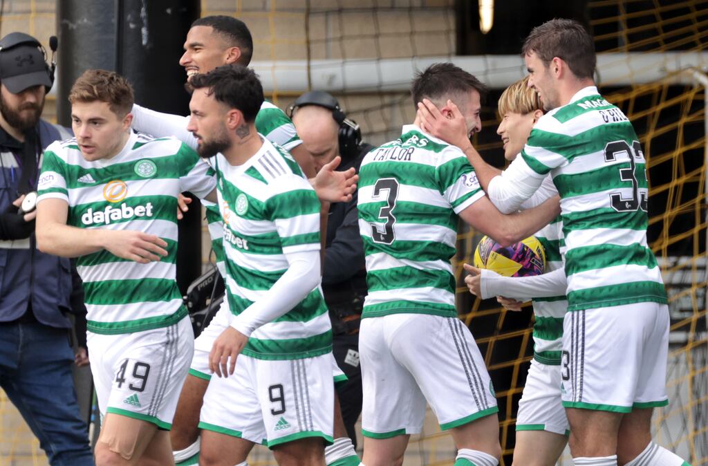 Celtic's Greg Taylor (third right) celebrates scoring their side's second goal of the game during the cinch Premiership match at the Tony Macaroni Arena, Livingston. Photograph: PA