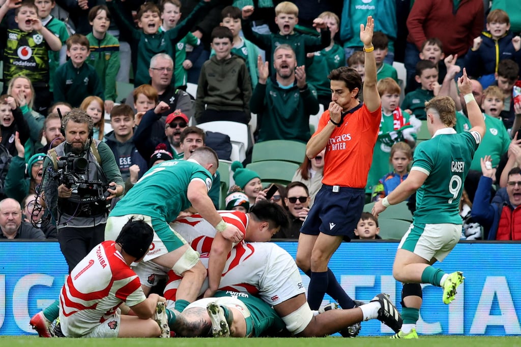 Italian referee Gianluca Gnecchi indicates a try for Ireland's prop Andrew Porter against Japan. Photograph: Paul Faith/AFP via Getty