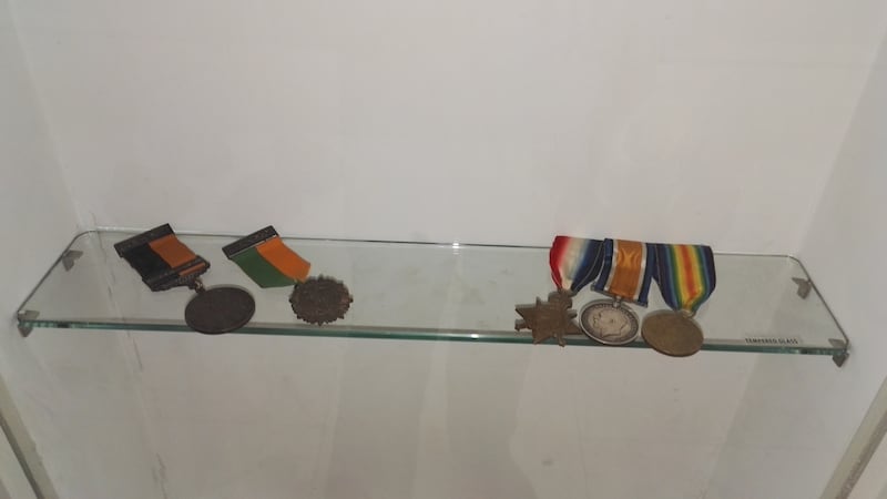 Winnie and George’s UVF and Easter Rising medals were placed together in Belfast City Hall in 2016 as a message of reconciliation