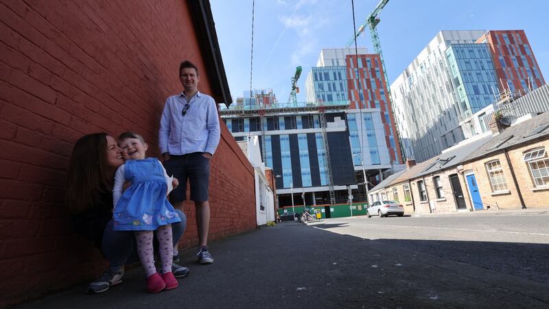 Mairead Brady with daughter (two years old) Muireann and partner Stephen Ryan, on Gerald Street. Photograph: Nick Bradshaw