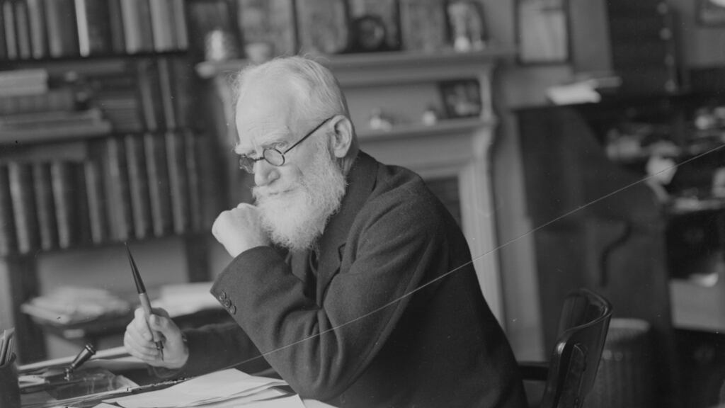 December 1928: Irish dramatist, essayist, critic and pamphleteer George Bernard Shaw (1856 - 1950) working at his desk. Photograph: Fox Photos/Getty Images