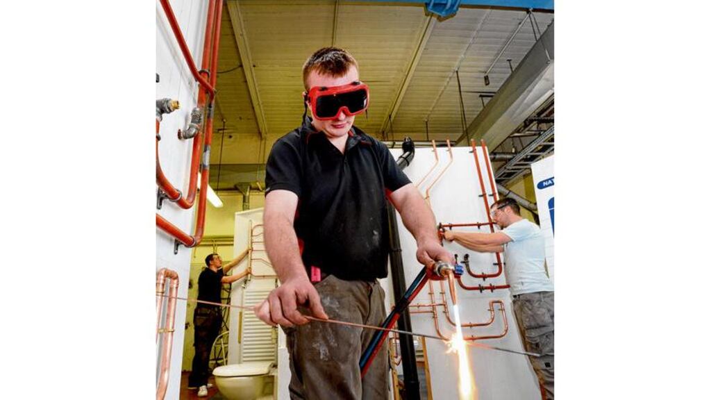 Apprentice plumbers Stephen Feeney, Andrew Fahy and Micheal Burke competing in the Ireland's Skills National Competition Final 2013 at Bolton Street, Dublin where Ireland's top apprentice plumbers, sheetmetal workers, cabinet makers and brick layers competed for the top titles. photograph: alan betson