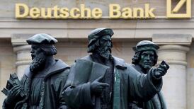 Deutsche Bank stock continues fall amid US settlement talks