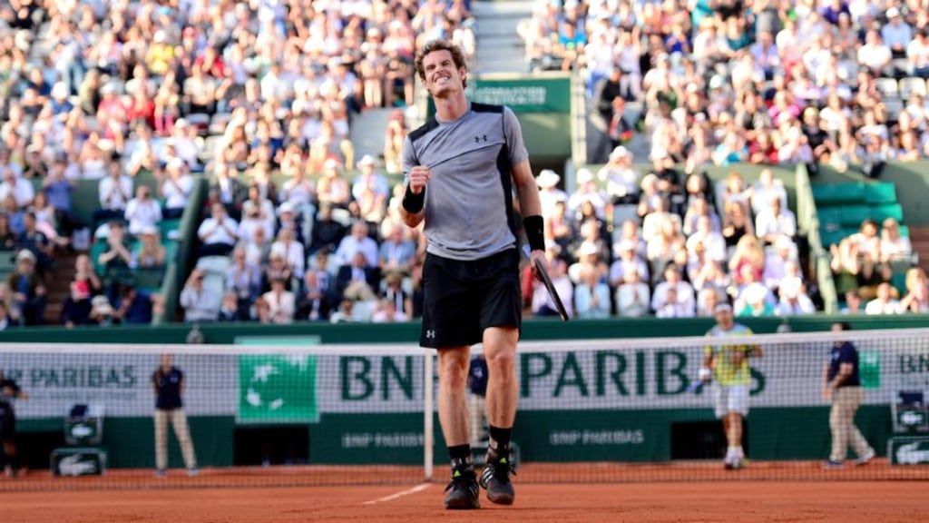 Andy Murray celebrates after beating Spain’s David Ferrer in the quarter-final of the French Open at Roland Garros in Paris. Photograph: Caroline Blumberg/Epa