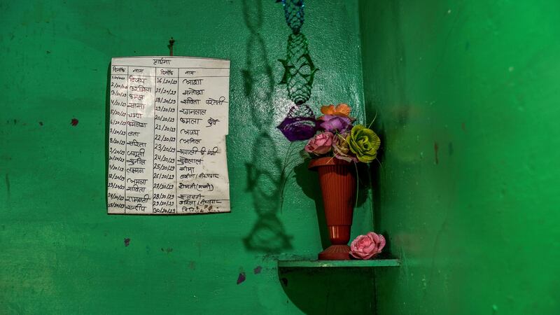 A prayer meeting schedule hangs on the wall at a house in Bilawar Kalan, India, on April 1st, 2021. Photograph: Atul Loke/New York Times
