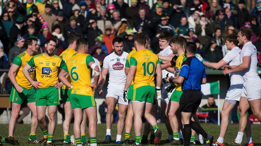 Referee David Gough speaks to the players during the Allianz League Division One clash between Donegal and Kildare. Photo: Evan Logan/Inpho