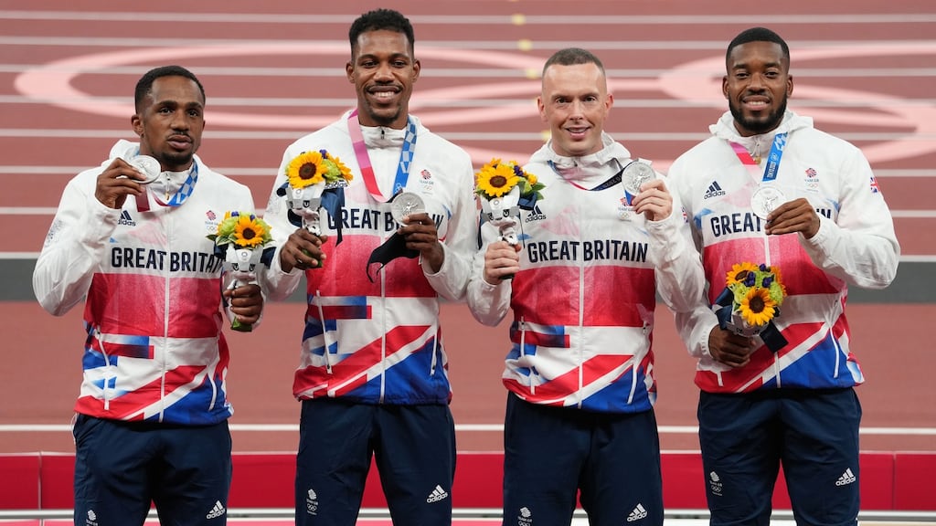Britain’s Chijindu Ujah, Zharnel Hughes, Richard Kilty and Nethaneel Mitchell-Blake on the podium in Tokyo with their silver medals. Photograph: Martin Rickett/PA