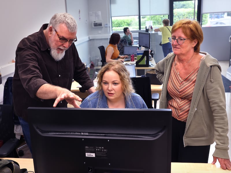 Conal O'Boyle, editor of The Nationalist, with reporters Marie Boran and Elizabeth Lee, at their office in Carlow town. Photograph: Dara Mac Dónaill