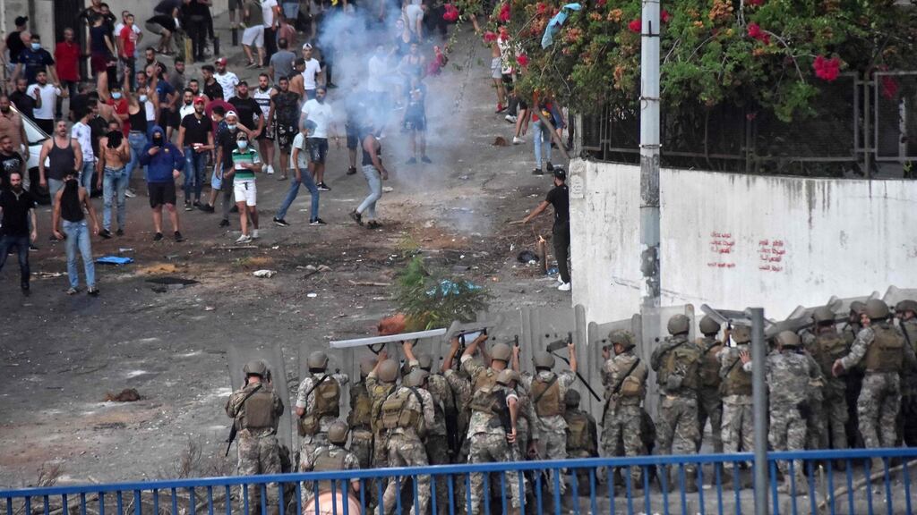 Lebanese soldiers fire rubber bullets amid clashes in Beirut with supporters of prime minister-designate Saad Hariri, who stepped down saying he was unable to form a government. Photograph: AFP via Getty
