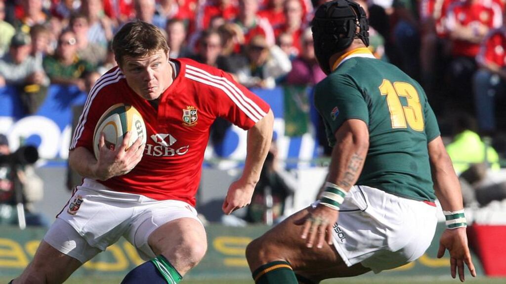 Brian O’Driscoll attempts to evade  Adi Jacob. Photograph: Inpho/Billy Stickland