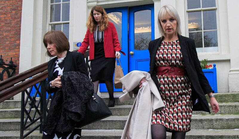 Clodagh Hawe's mother, Mary Coll (left), and sister Jacqueline Connolly (right) leaving the Department of Justice on St Stephen's Green in Dublin. Photograph: Gareth Chaney/Collins