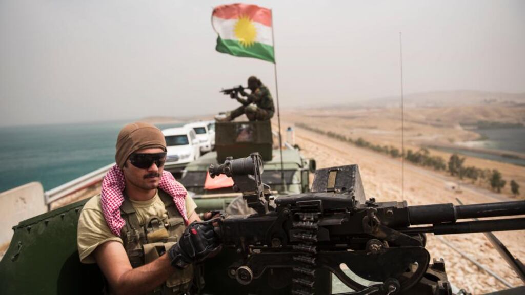 Kurdish peshmerga fighters near the Mosul Dam in Northern Iraq yesterday following itsrecapture from Islamic extremists. Photograph: Lynsey Addario/The New York Times